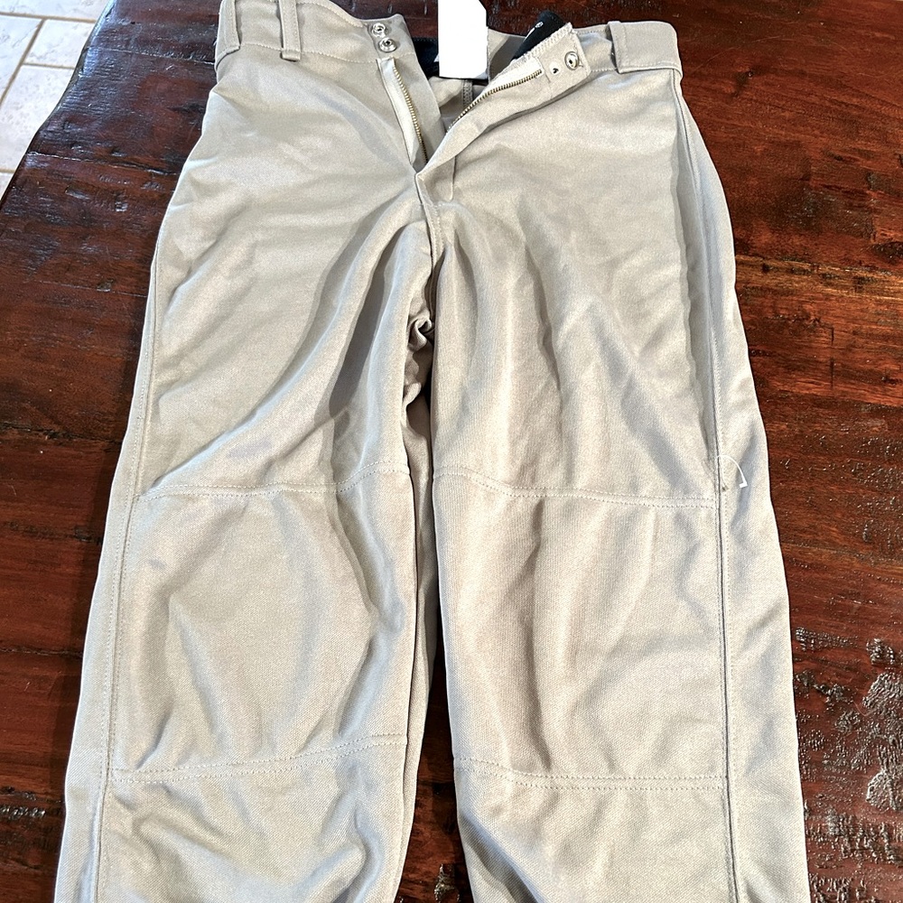 Franklin youth large baseball pants.one button missing at top.